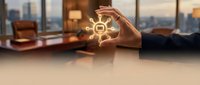 Person holding glowing network icon above desk in modern office with city skyline view, representing digital connectivity, business communication, and technology innovation.