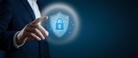 Professional businessman touching glowing cybersecurity shield with padlock icon representing data protection and digital security solutions for business.