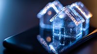 Glowing holographic house emerging from smartphone screen with sparkles and bokeh lights in blue tones, concept of smart home technology and digital real estate.