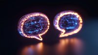 Glowing neon speech bubbles with digital network pattern inside floating on dark background, creating modern communication concept with light reflection.