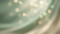 Soft blurred bokeh lights creating dreamy atmosphere with warm golden and green tones for backgrounds and overlay effects in creative projects.