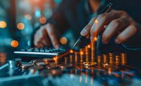 Stacked coins showing upward trend with calculator and hands counting money in dark ambient lighting with bokeh effects. Financial growth concept for business success.