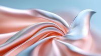 Smooth flowing silk fabric in coral pink and light blue creates gentle waves and folds, showcasing luxurious textile movement and soft color transition.