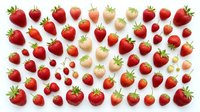 Fresh ripe strawberries collection isolated on white background. Various sizes and ripeness stages of organic red berries for healthy eating and cooking.