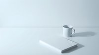 Minimalist still life composition featuring a white ceramic pitcher and kitchen knife on neutral surface with soft shadows and clean aesthetic.