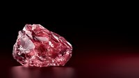 Raw pink diamond crystal on dark background with dramatic lighting and reflection, precious gemstone specimen showing natural crystalline structure and transparency.