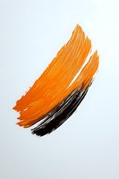 Orange and black brush strokes on white background creating dynamic paint texture for creative design projects and artistic compositions.