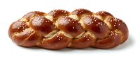 Braided loaf of challah bread with golden-brown crust and sesame seeds, isolated on white background for bakery, food packaging, and culinary design projects.
