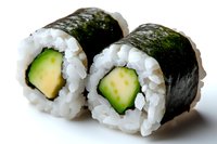 Fresh cucumber sushi rolls with white rice and nori seaweed wrap on white background, close up view of traditional Japanese maki rolls for menu design.