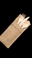 Wooden cutlery set with fork, knife and spoon in a burlap pouch, isolated on transparent background, ready for eco design, stickers, and print on demand.