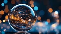 Magical crystal ball reflecting golden sparkles and light trails against blurred bokeh background creates mystical atmosphere for fortune telling and divination concepts.