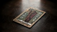 Vintage tarot card with mystical symbols lying on dark wooden surface in dramatic lighting for fortune telling and divination practices.