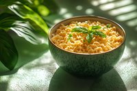 Steaming bowl of instant noodles garnished with fresh basil leaf in ceramic bowl, natural sunlight casting leaf shadows, moody food photography styling.
