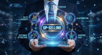 Businessman holding glowing up-selling concept with sales growth, AI automation, strategy and shopping cart icons on dark background.