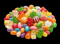 Colorful mixed candy pile with gummy bears, jelly beans, and lollipops, isolated on transparent background. Ready for stickers, t-shirt design, and print on demand.