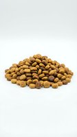 Pile of dry pet food kibble isolated on white background for animal nutrition and feeding concepts.