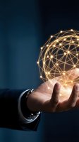Businessman hand holding glowing digital network sphere with connected lines representing global connectivity, innovation and technology solutions.