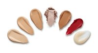 Cosmetic foundation and concealer swatches in various skin tones arranged in circle on white background for makeup color matching and beauty applications.