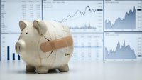 Injured piggy bank with bandage on financial trading desk with charts and graphs showing market recovery and investment healing concept.