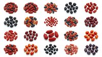 Assorted fresh berries including strawberries, blueberries, raspberries and cherries arranged in organized groups on white background for food and nutrition design projects.