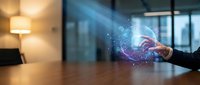 Businessman hand touching futuristic holographic interface with glowing particles and digital network connections in modern office environment.