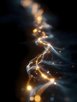 Glowing golden and white light streams swirl against dark background creating magical ethereal effect with bokeh particles and luminous energy flow.