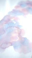 Soft pastel watercolor clouds in pink and blue hues creating dreamy sky background for wedding invitations and feminine design projects.