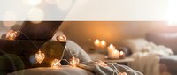 Cozy bedroom scene with warm string lights creating romantic ambiance on soft bedding. Perfect for home decor, lifestyle content, and relaxation themes.