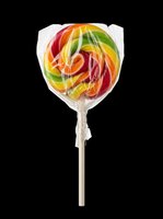Colorful swirled lollipop with red, yellow, and green stripes, wrapped in clear cellophane with twine bow on wooden stick. Isolated on transparent background, ready for clipart, t-shirt design, stickers, and print-on-demand products.