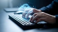 Businessman hands typing on laptop with glowing cloud computing network icons and data connections floating above keyboard in modern office environment.