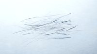 Abstract black ink brush strokes on white paper creating dynamic linear composition for modern graphic design and artistic projects.