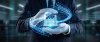 Businessman holding holographic data analytics dashboard with glowing charts and graphs in hands. Digital transformation and business intelligence concept.