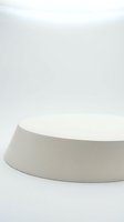 Minimalist white cylindrical podium platform on neutral background for product display and presentation mockups.