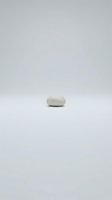 Single white oval soap bar isolated on neutral background, ready for product photography, packaging design, and cosmetic advertising.