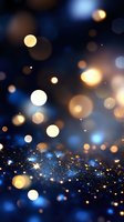 Magical glowing bokeh lights on dark blue background with golden sparkles and blurred circles creating dreamy atmospheric effect for festive designs.
