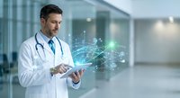 Professional male doctor using digital tablet with holographic medical network interface in modern hospital corridor for healthcare technology.