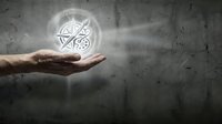 Hand holding glowing pentagram star symbol with magical light rays against concrete wall background for spiritual and mystical design projects.