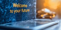Glowing welcome message on digital device screen with bokeh lights and smartphone in background, modern technology concept for new beginnings.