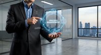 Professional businessman presenting process management concept with holographic interface in modern office environment overlooking city skyline.