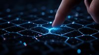 Finger touching glowing network of connected hexagons on dark background with blue light effects, representing digital transformation and connectivity.