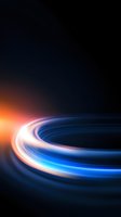 Dynamic light trails forming curved path against dark background, glowing with vibrant blue and orange colors creating futuristic motion effect for technology designs.