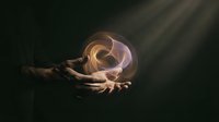 Hands holding glowing energy orb with swirling light patterns in dark mystical atmosphere for spiritual healing meditation and magic concepts.