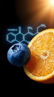 Vitamin K molecular structure with fresh orange slice and blueberry on dark background for nutrition education and healthy lifestyle content.