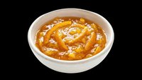 Caramelized onion chutney in a white ceramic bowl, isolated on transparent background, ready for food menus, stickers, print on demand, and clipart design use.