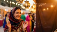 Young Middle Eastern woman in traditional headscarf smiling at evening market with warm lantern lights and colorful crowd background for cultural lifestyle content.