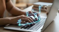 Woman typing on laptop with digital social media icons floating above keyboard representing online networking and digital communication technology.