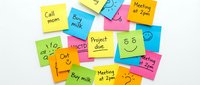 Colorful sticky notes with handwritten reminders and to-do list items arranged on white background for organization, planning, and productivity purposes.