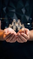 Hands holding glowing family figures representing protection, care and insurance coverage for loved ones in dark office environment.