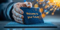 Glowing welcome message on sparkly blue surface with magical particle effects and hands holding inspirational text about future possibilities and new beginnings.