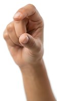 Close-up of an isolated hand gesture showing two fingers crossed for luck, superstition, or hope. Suitable for motivational, educational, and commercial design projects.